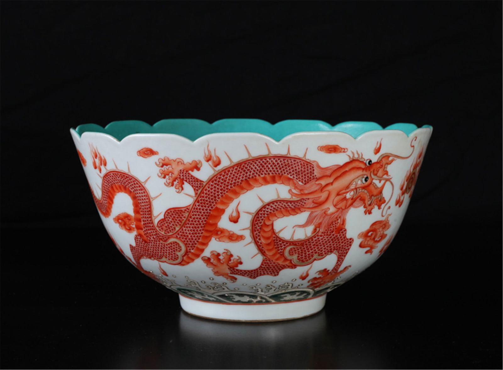 Antique Chinese Famille Rose Bowi: Scalloped edges turquoise interior the body painted to depict iron red dragons chasing a flaming pearl. Six character mark in blue on underside. 4.375"""" H x 8.5""""?"""