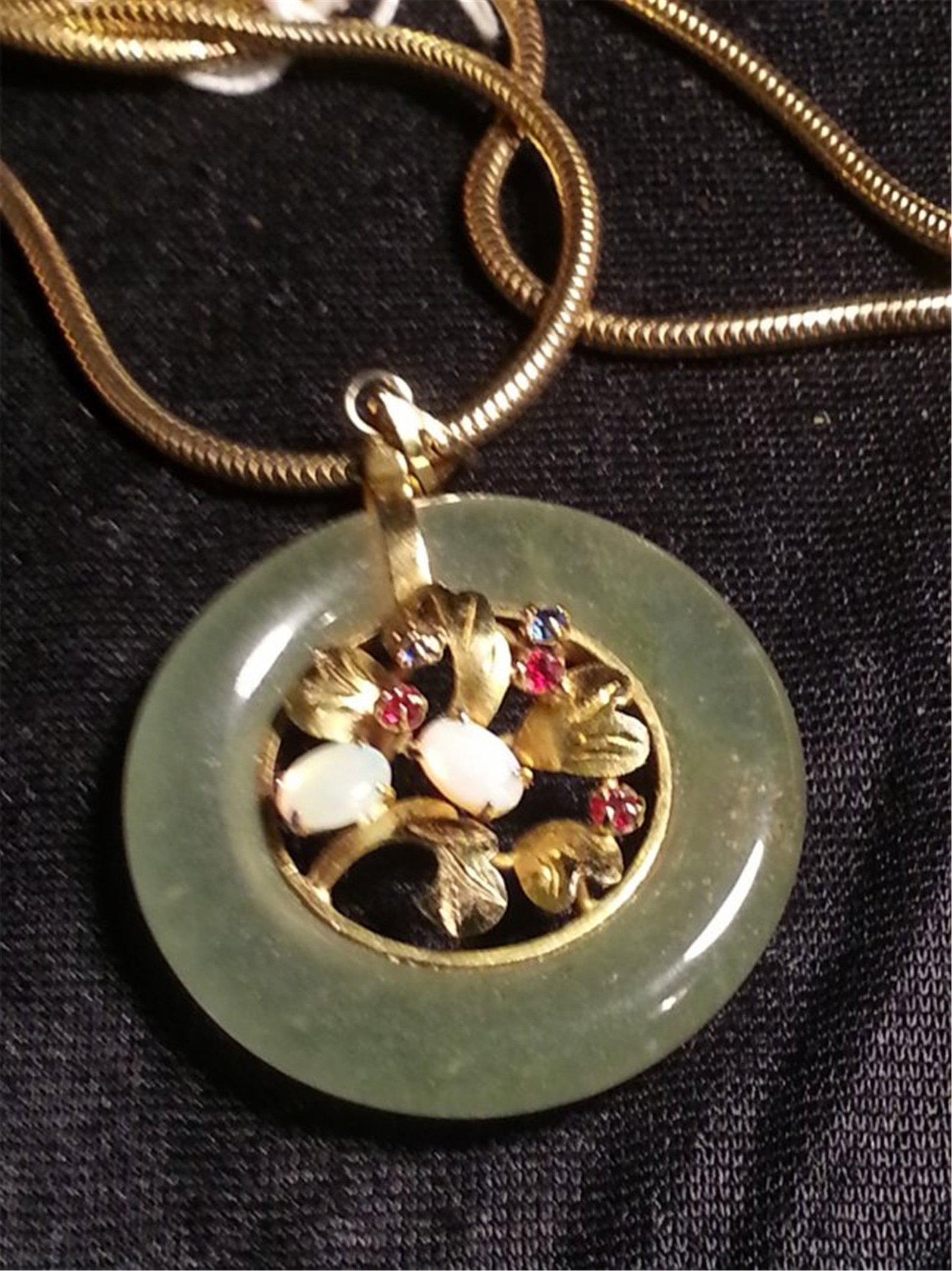 OPPO, jade necklace: OPPO, jade necklace