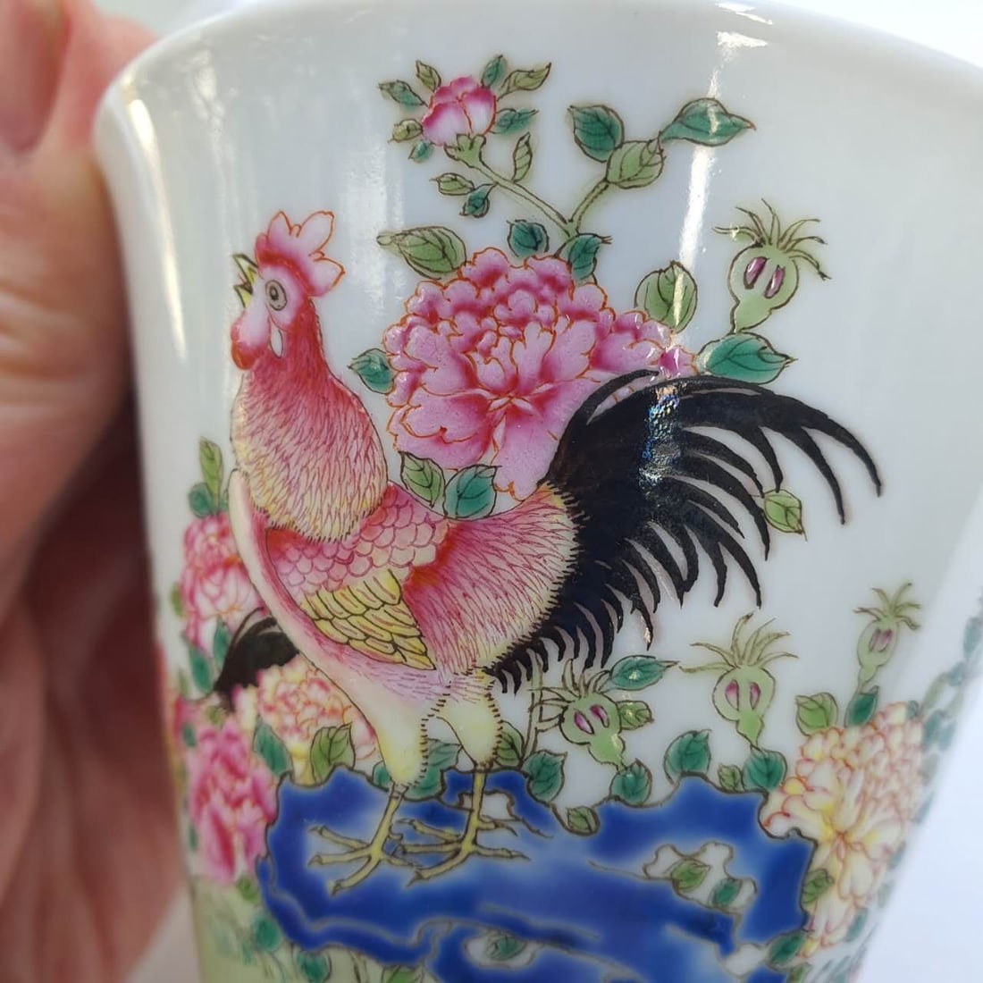 A pair of *Falangcai* (Enamel) cups depicting floral and bird motifs;珐琅彩花: A pair of *Falangcai* (Enamel) cups depicting floral and bird motifs;dating to the Republic of China era or earlier.珐琅彩花鸟杯，民国或