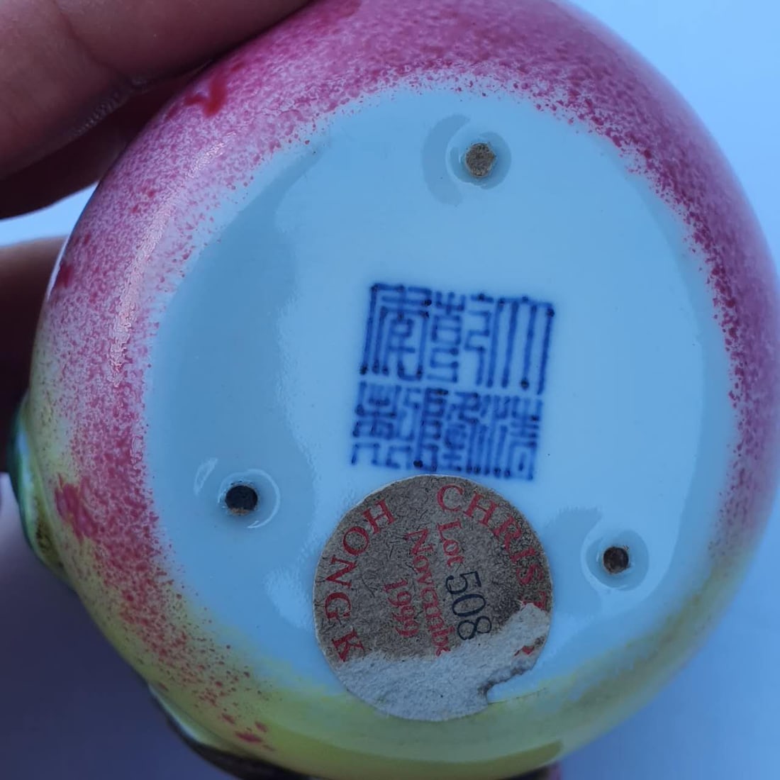 A small polychrome water dropper bearing the mark of the Qianlong reign. (1 of 6)