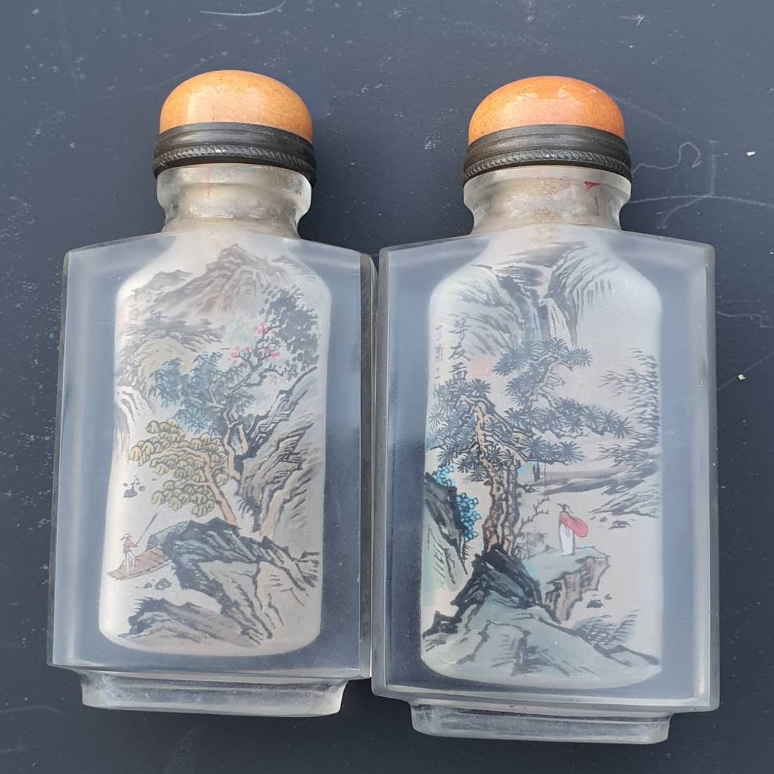A pair of inside-painted crystal snuff bottles, (1 of 16)