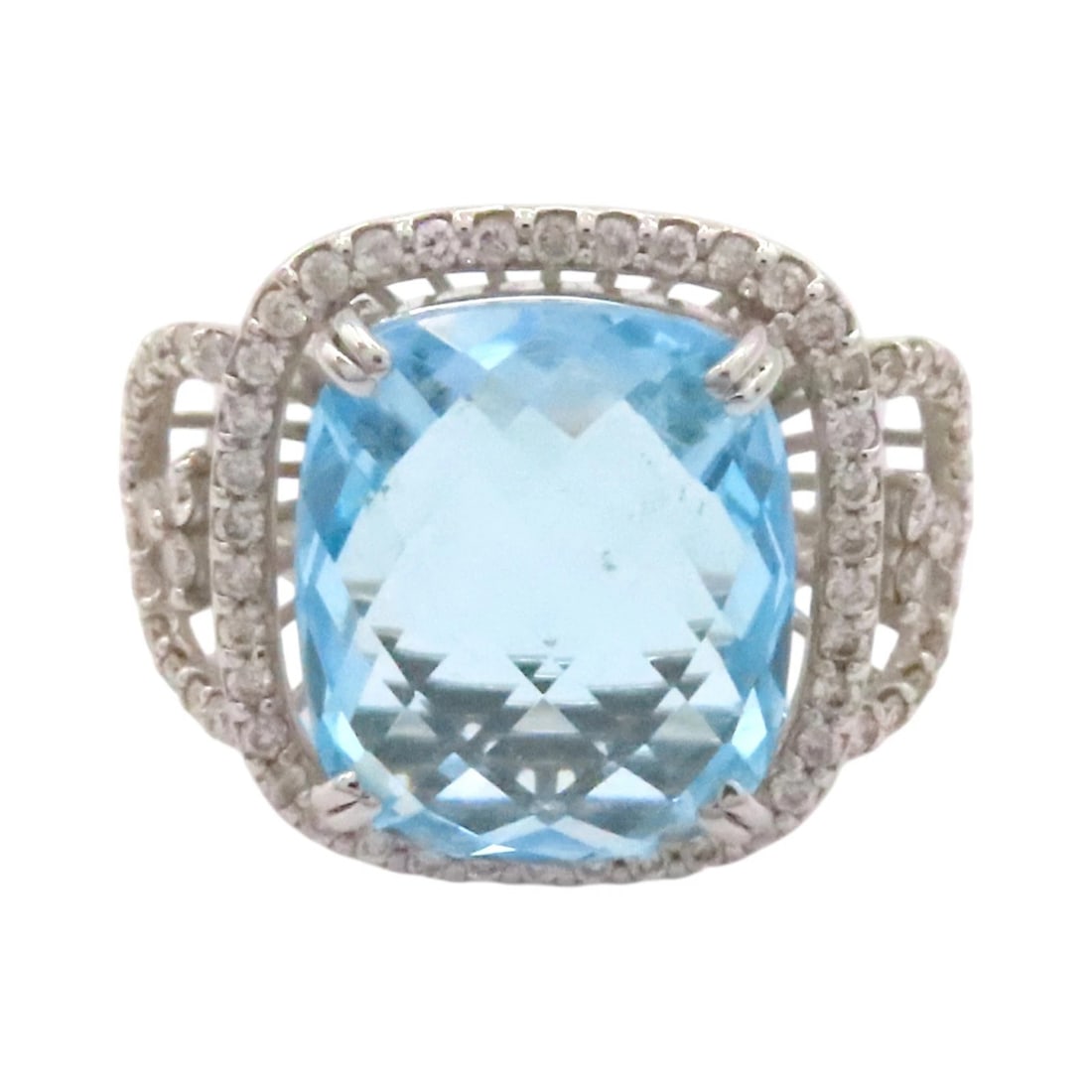 BLUE TOPAZ AND DIAMOND PLATINUM RING WITH PAVe-SET HALO AND ARCHITECTURAL DESIGN (20TH CENTURY) (1 of 2)