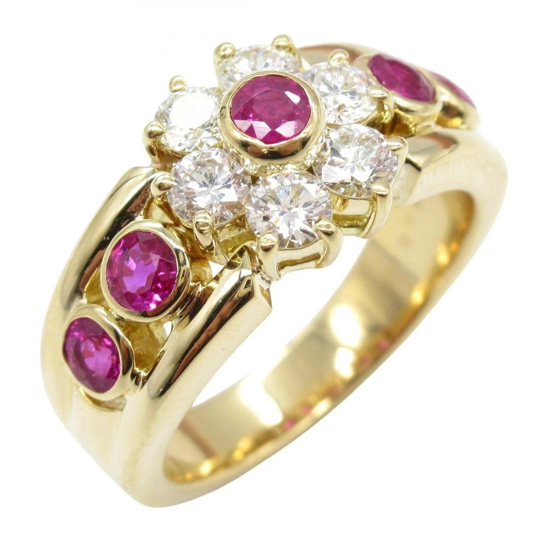 RUBY AND DIAMOND FLORAL CLUSTER RING WITH CENTRAL BRILLIANT-CUT DIAMOND (20TH CENTURY): RUBY AND DIAMOND FLORAL CLUSTER RING WITH CENTRAL BRILLIANT-CUT DIAMOND (20TH CENTURY) Provenance and Authenticity: This elegant floral cluster ring presents a harmonious composition of diamonds and v