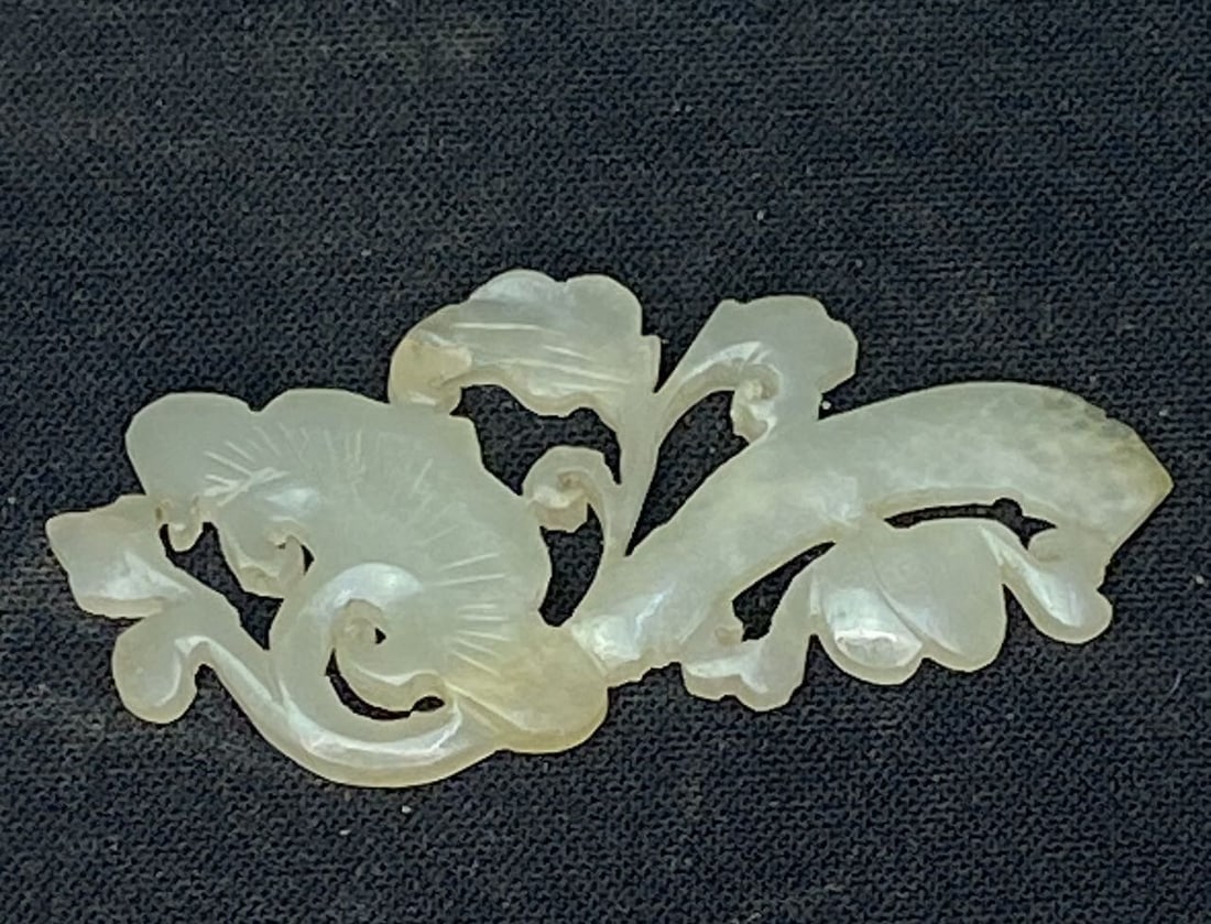 A White Jade Carved in Ruyi from Qing Dynasty (1 of 3)