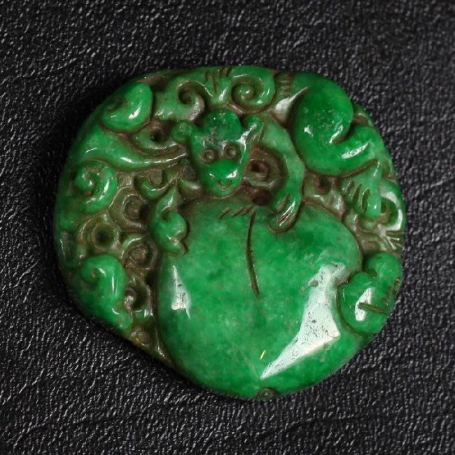 Chinese Carved Jade Plaque: Carved on one side depicting monkey and peach, other side carved with belly of beetle. 2" x 1.875"