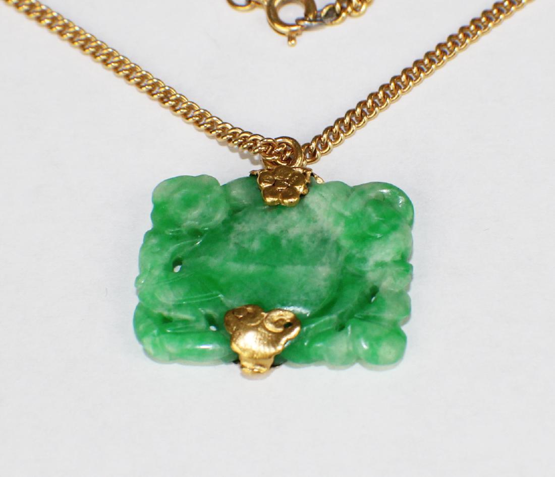 A LIGHT GREEN JADEITE PENDANT WITH 22K GOLD NECKLACE (1 of 3)