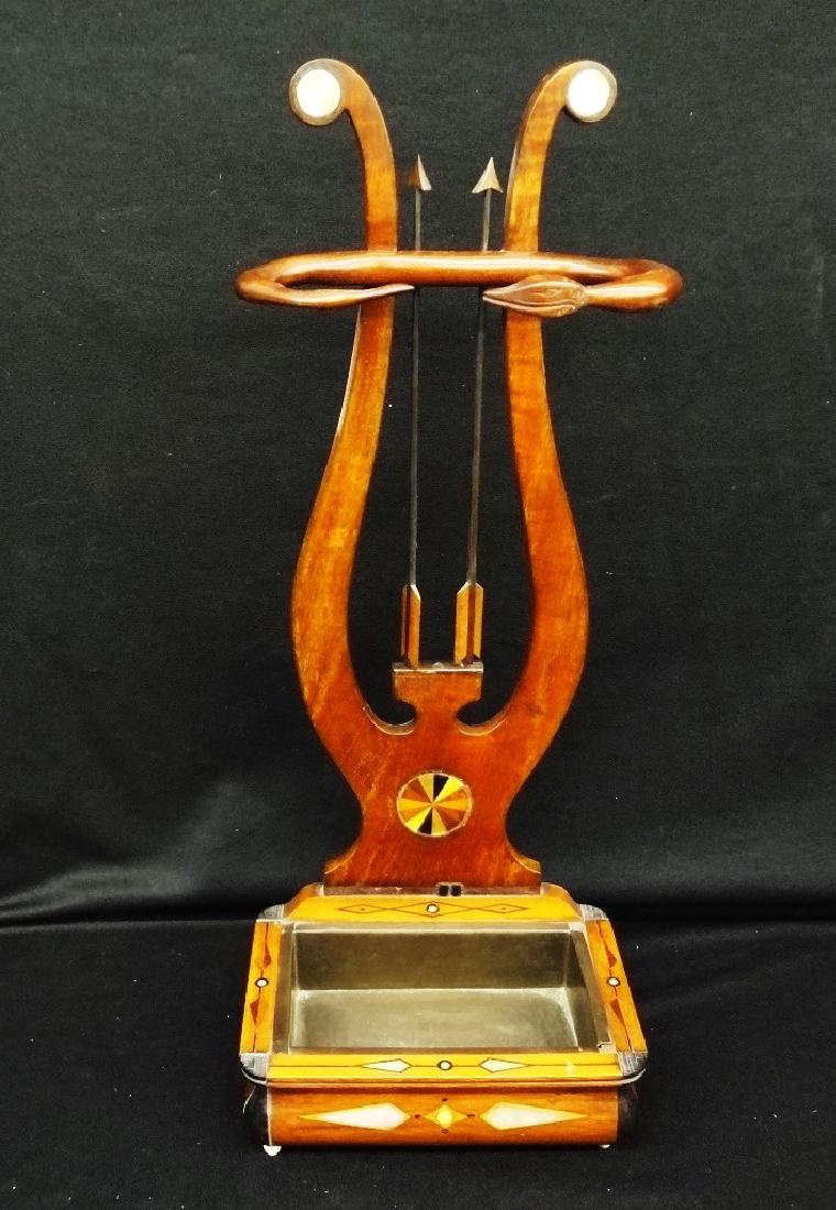 Hand Carved Cane/Umbrella Stand with Inlaid Wood and: Hand Carved Cane/Umbrella Stand with Inlaid Wood and Snake carved decoration: A stunning hand made cane or umbrella stand. Inlaid mother of pearl and colored wood decorate the piece on all sides. Meta