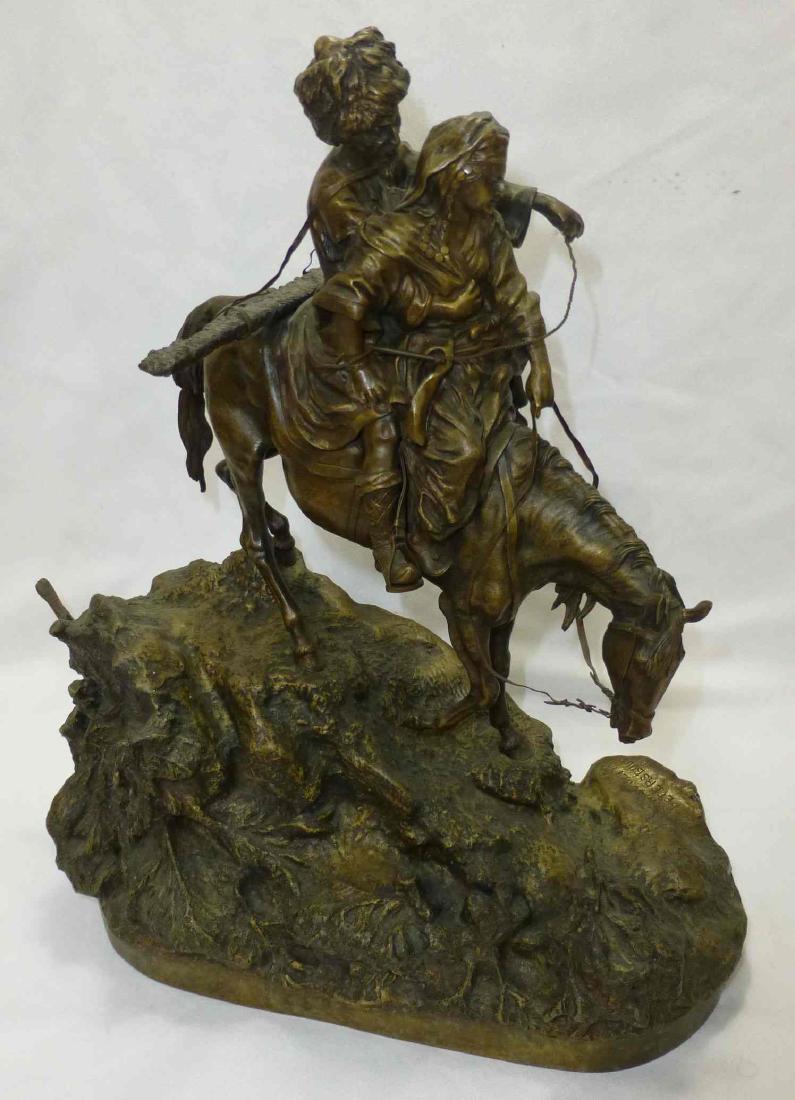 Vassili Grachev (Russian 1831 - 1905) Bronze Man and: Vassili Grachev (Russian 1831 - 1905) Bronze Cossack & Sweetheart Descending Rocky Slope with Woerfell Foundry Mark. Signed Back. approx. 14" tall, 12 1/2" long x 6 3/4" wide.