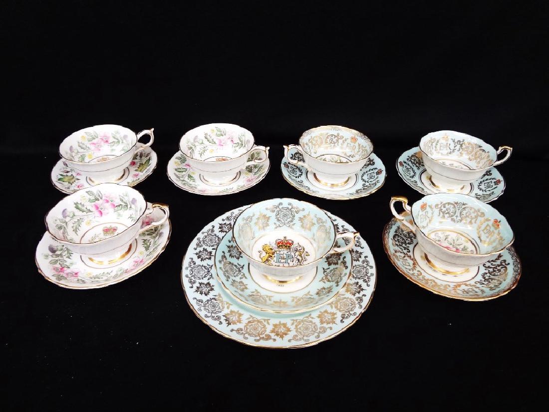 (7) Queen Elizabeth II Tea Cup Saucer Sets Paragon: (7) Queen Elizabeth II Tea Cup Saucer Sets Paragon China: A gorgeous group of (7) tea cup and saucer sets. (3) are by appointment by Paragon China in pale green, (3) Paragon china in white, (1) tea cu