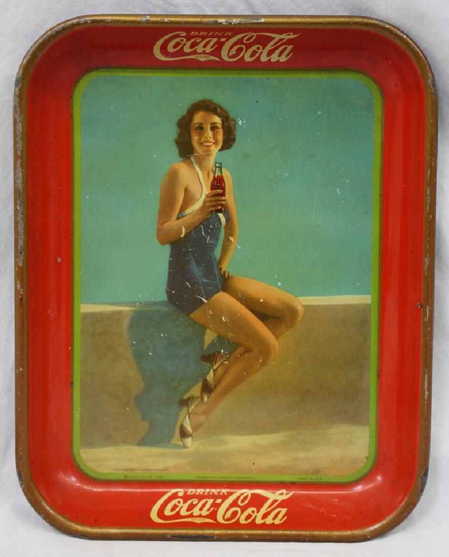 1933 Coca Cola Francis Dee Swimsuit Coke Tray: Several small nicks on front with age appropriate wear on back. No dents. Overall condition (Very Good). Size 13 - 14" x 10 - 1/2". Suggested bid $300