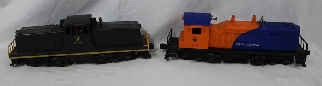 Pair of Lionel Diesel Engines #611 & 628: Pair of pre-owned Lionel Diesel Engines including #628 Northern Pacific and #611 Jersey Central. Untested by us but appear to be in excellent condition. Sold as is. Suggested bid $100