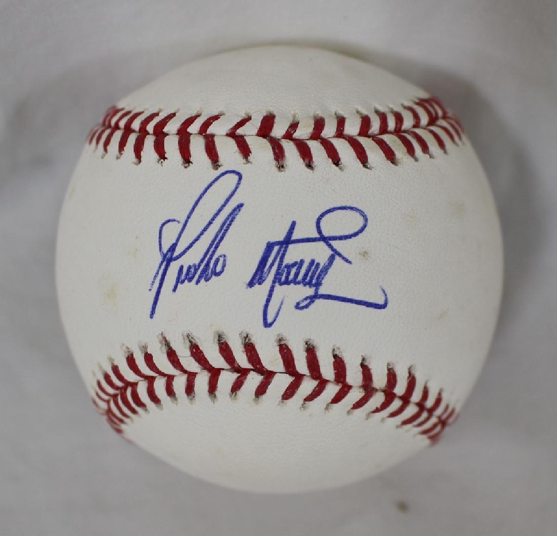 Pedro Martinez Autographed OAL Selig Baseball SGC: Clean, single signed Pedro Martinez autographed baseball. One ot the best righties that has ever played the game. (3) Time Cy Young award winner. SGC basic cert. Suggested bid $150