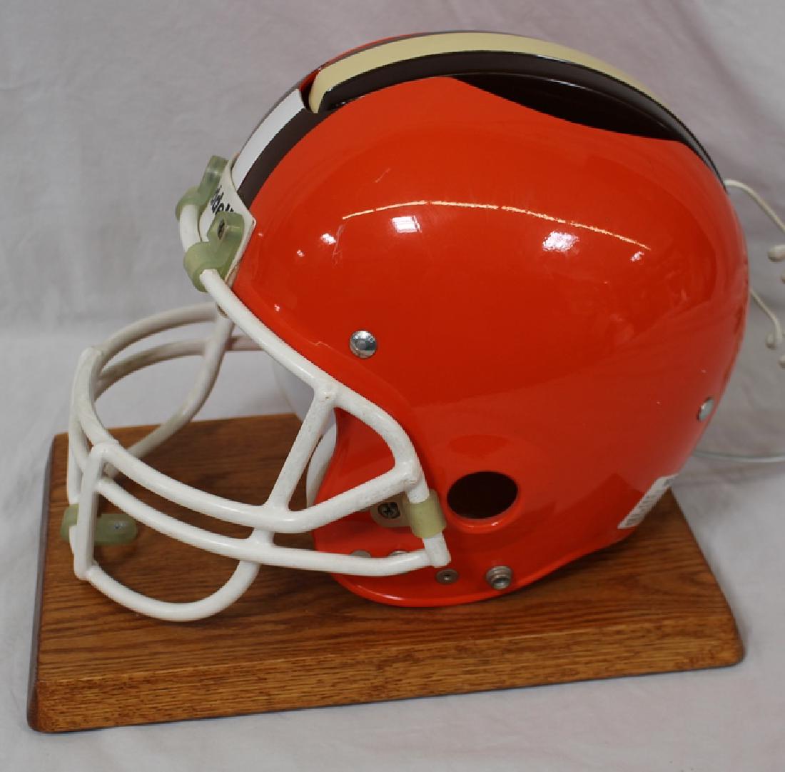 The Ultimate Cleveland Browns Man Cave Piece!: A great item for the Cleveland Browns fan with Brown's cave that has everything else. A full size helmet telephone set! This awesome piece is mounted to a stained board. Working condition, the phone i
