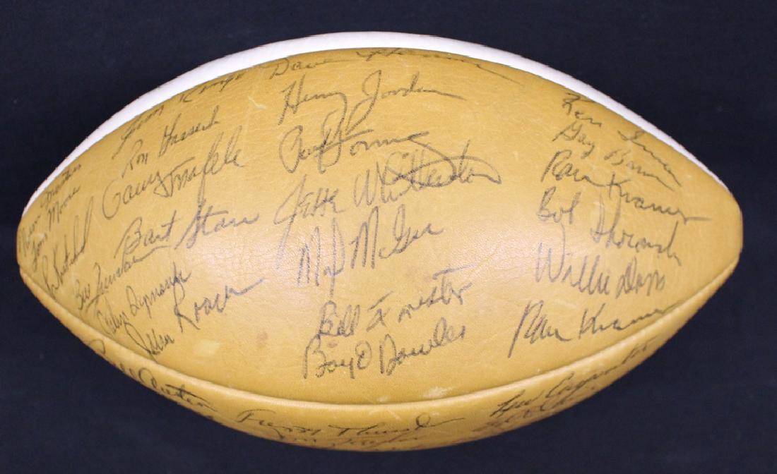 1962 Green Bay Packers Championship Team Signed: Exceptional, team signed 1962 Green Bay Packers Wilson white panel football. (37)signatures total with (10) Hall of Famers incl. Lombardi, Starr, Hornung, Taylor, Davis, Nitschke, Wood, Kramer, Ringo 