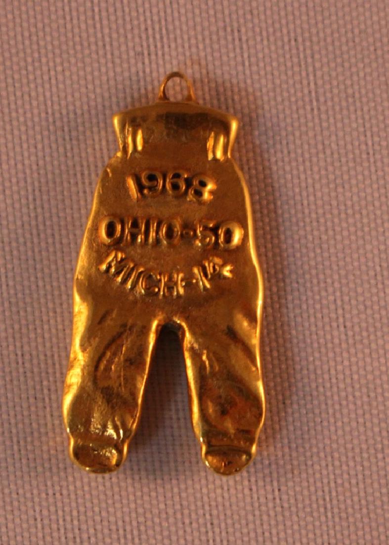 1968 Ohio State Gold Pants National Champs: 1968 Ohio State Buckeyes Football Gold Pants in outstanding condition. Ohio State 50-14 victory over Michigan was in Columbus,OH. Ohio State went on to win the National Championship against USC defeat