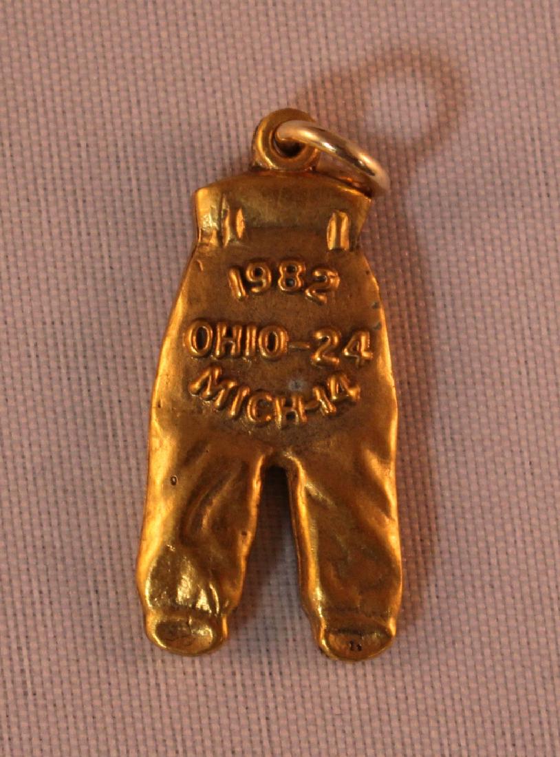 1982 Ohio State Buckeyes Gold Pants: 1982 Ohio State Buckeyes Gold Pants with the initials JF. This could have been Jerome Foster or John Frank that year. Ohio State 24, Michigan 14. Suggested bid $2500