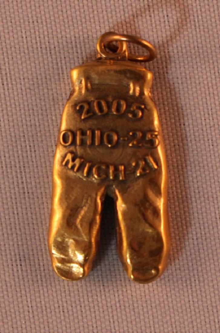 2005 Ohio State Buckeyes Gold Pants: 2005 Ohio State Buckeyes Gold Pants with the player's initials RH. There were three players that year with the initials RH. OSU 25, Michigan 21. Suggested bid $2000