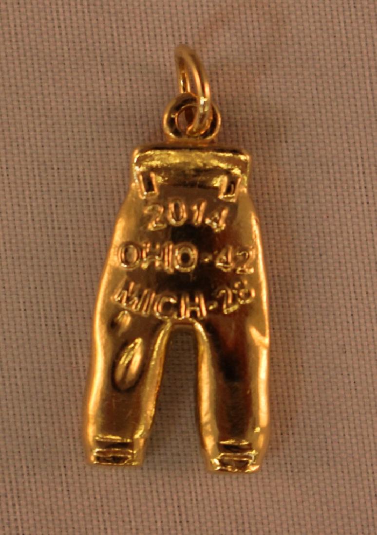 2014 Ohio State Gold Pants: 2014 Ohio State Gold Pants in Mint condition. Ohio State 42, Michigan 28. Suggested bid $2500