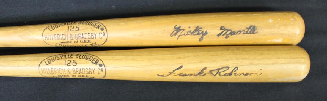 Mickey Mantle & Frank Robinson LS Vintage Mini-Bats: Nice pair of vintage Louisville Slugger mini bats of Hall of Famers Mickey Mantle and Frank Robinson. Both in excellent condition. Suggested bid $75