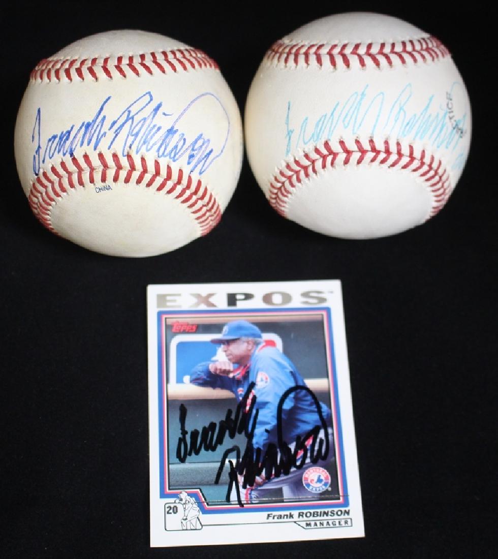 Pair of Frank Robinson autographed baseballs &: Two autographed Frank Robinson baseballs, the first being on a OML Bud Selig practice ball with HOF 82 inscription, the second, with a large dark blue signature on the sweet spot of the Florida League