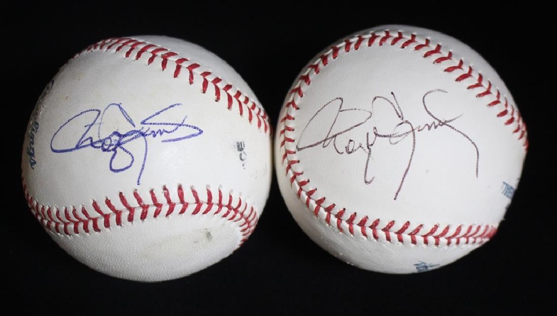 Pair of Roger Clemens Autographed Baseballs: Great pair of Roger Clemens signed Bud Selig OAL practice baseballs. Both are on the west panel. Comes with a JSA ALOA for the pair. Suggested bid $120