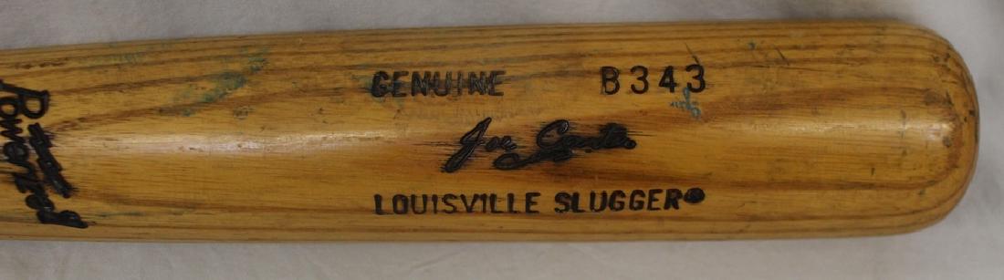 Joe Carter Game Used B343 Louisville Slugger: Joe Carter Game Used Louisville Slugger, 1986-1989 with good game use, 35" in length, lightly cracked, small chip of wood missing on knob, loads or pine tar. Comes with an autographed card. Suggested 