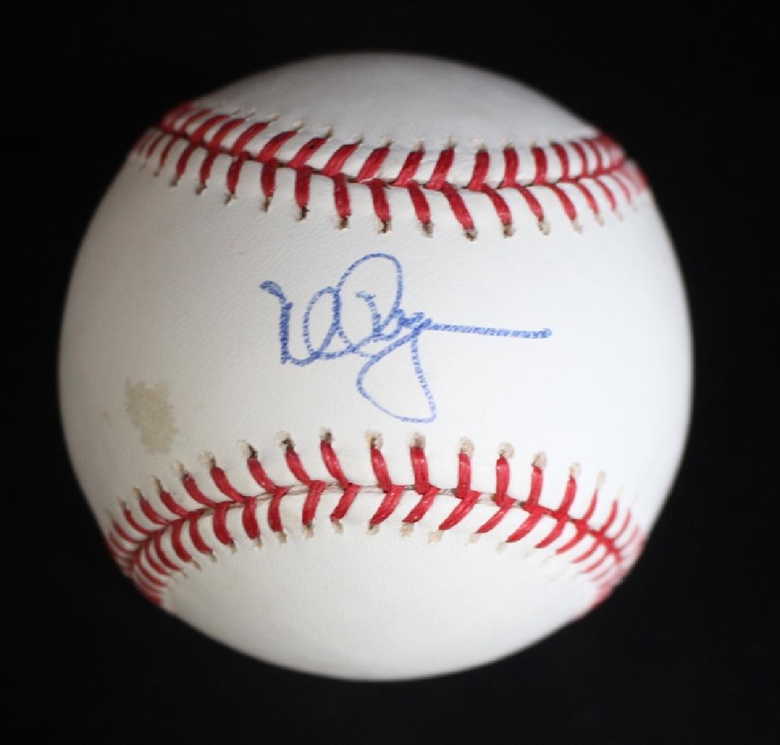 Mark McGwire autographed Bud Selig OML baseball: Mark McGwire autographed OML Bud Selig baseball on the sweet spot. Small area of discoloration to the left of signature. Comes with a JSA ALOA. Suggested bd $75