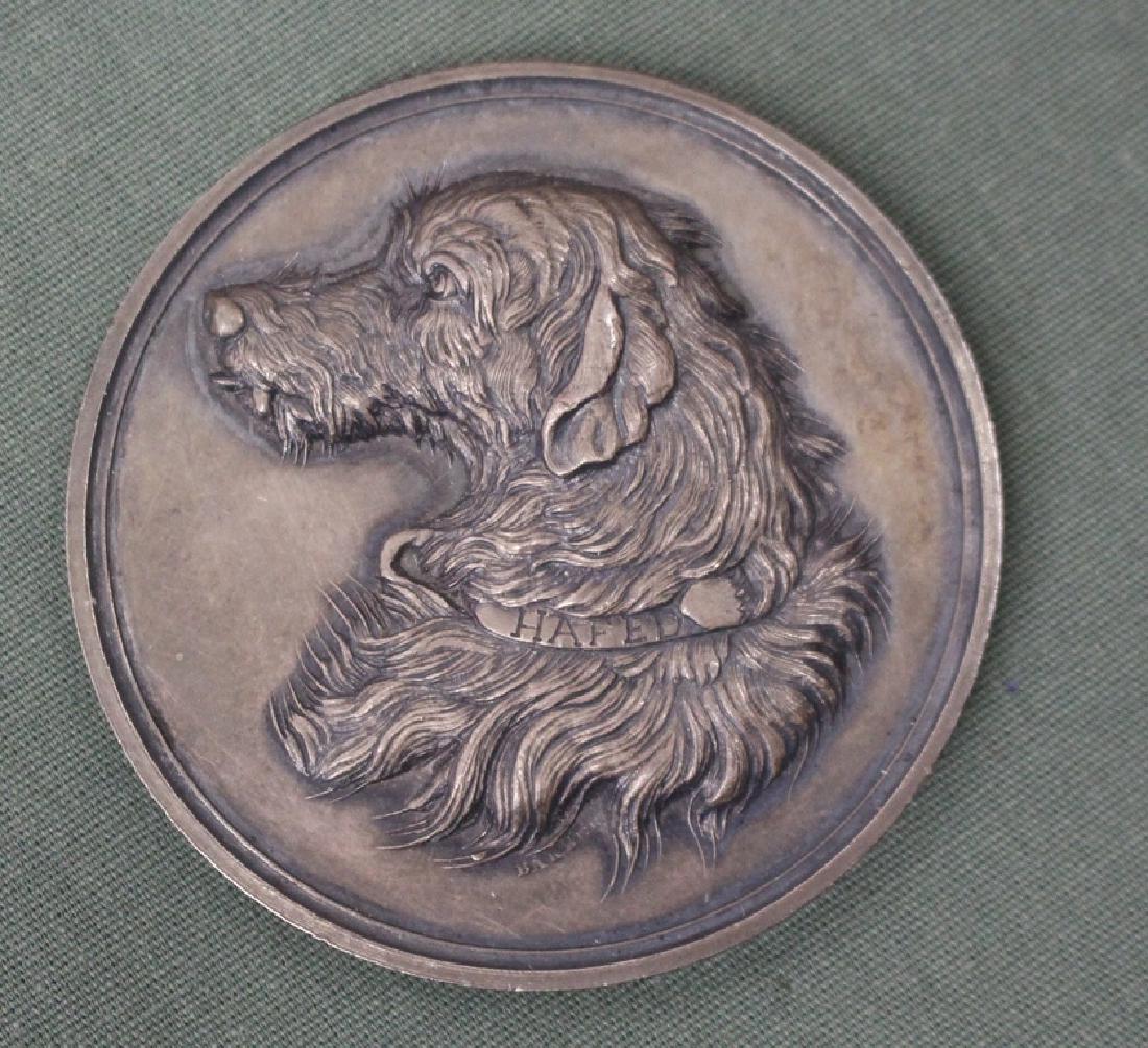 1887 Philadelphia Kennel Club Silver Dog Medal: Beautifully struck silver medal given out by the Philadelphia Kennel club to winners of their dog show. The medal is 2"in diameter and weighs just shy of two troy ounces. Hi bas relief image of a dog 
