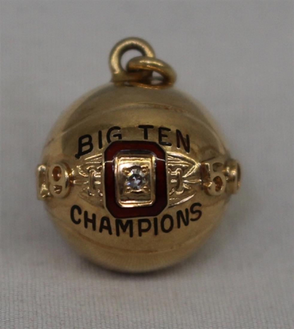 1950 Ohio State Big Ten Basketball Championship 10k: Incredible 1950 Ohio State Basketball Big Ten Championship 10k gold charm. Shaped like and miniature basketball. Stamped 10k. Engraved "Dr.Walter R. Duffee Phys.". Small diamond in large ruby colored 