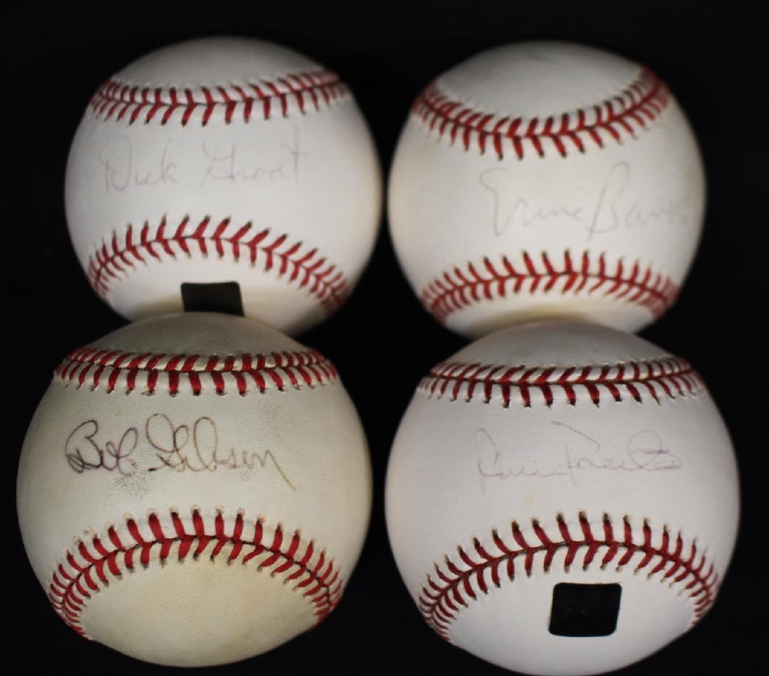 Bob Gibson Dick Groat Ernie Banks Robin Roberts signed: Bob Gibson Dick Groat Ernie Banks Robin Roberts signed baseballs. The best of which is the Gibson which is a little dingy, the other three are lightly faded but still legible. Suggested bid $100