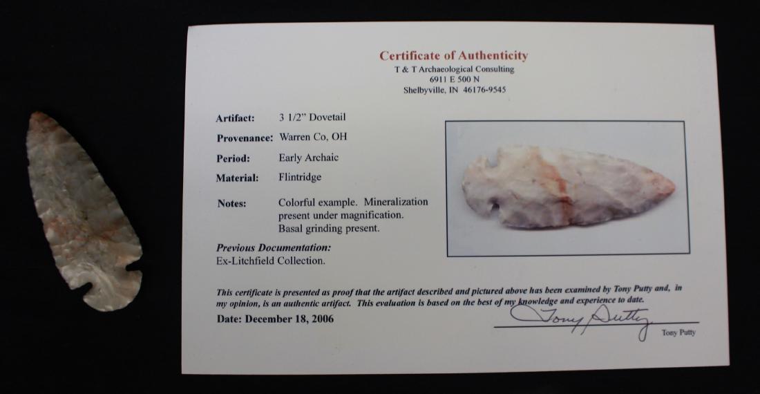 3-1/2" Dovetail Point Warren County Ohio: Early archaic period, 3-1/2" dovetail point made of flintridge from the Litchfield collection with a COA from T&T Consulting signed by Tony Putty. He noted: Colorful example Mineralization present und