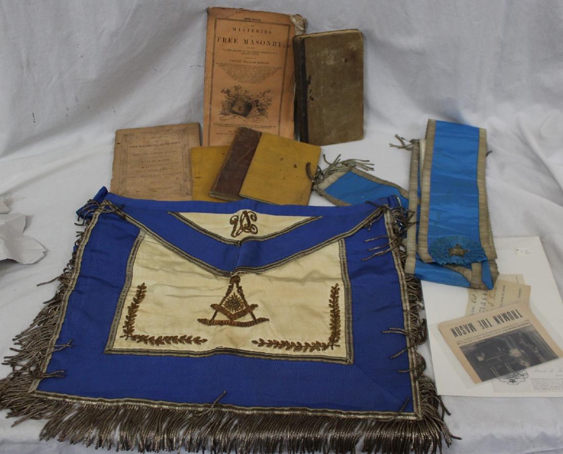 Lot Masonic Books and Other Items: Useful lot of old Masonic items incl. a mid 1940's Masonic apron, a 19th c. Masonic officers collar, Soft and Hard cover Morgan Exposes, (3)19h c. Masonic Arch books, 1849 Maine proceedings, other pub