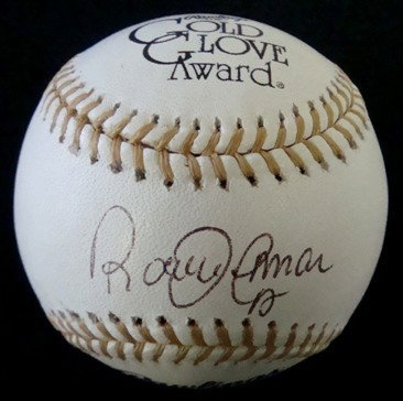 Roberto Alomar Autographed Gold Glove Award Ball: Official Ball Rawlings Gold Glove Award Ball signed by Alomar on the sweet spot in black ball point pen; comes with a Certificate of Authenticity from Fusco Auctions.