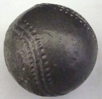 Circa 1950's Cast-Iron/Lead Pitcher's Baseball: Circa 1950's Cast Iron/Lead Baseball; ball weighs 4.5 pounds and is the size of a regular baseball; similar baseballs were used to keep a pitcher's arm from tightening up after throwing for more than 