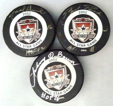 Lot of (3) Hockey HOFers Signed Pucks, JSA: Lot of (3) Hockey HOFers Signed Pucks; outstanding condition; includes Johnny Bower signed in silver sharpie with HOF 76 inscription; Marcell Dionne and Brad Park; lot comes with a COA from JSA.