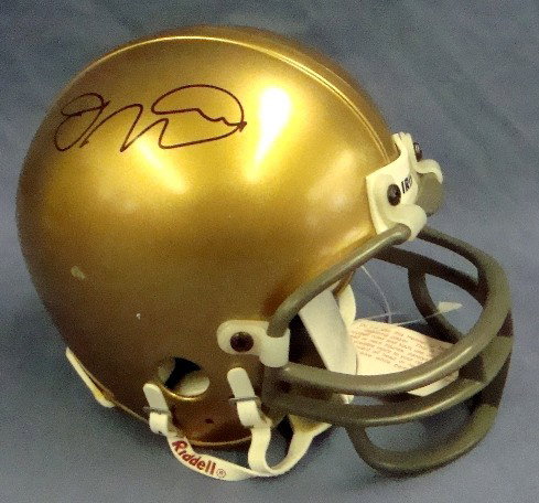 Joe Montana Irish Autographed Mini Helmet, JSA: Joe Montana Notre Dame Fighting Irish Autographed Mini Helmet; signed in black sharpie marker on the all-gold helmet; 'Irish' stamp on back and front of helmet; comes with a COA from James Spence Auth