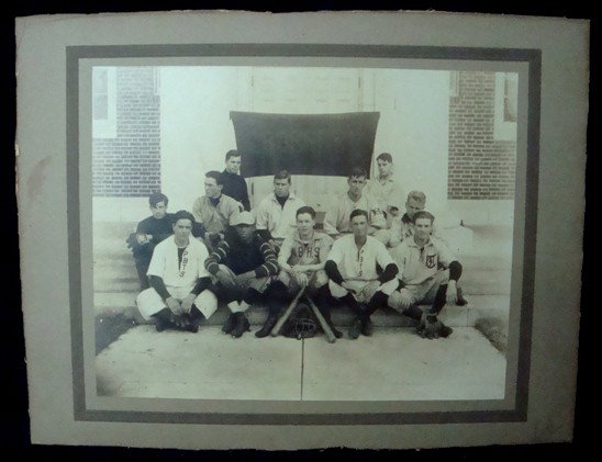 1890's Boys Baseball Team Photo: Outstanding vintage photo of an 1890's boys baseball team; includes one negro player in period matting, ready for framing; measures approx 14x12; Crossley banner in background; great vintage piece.