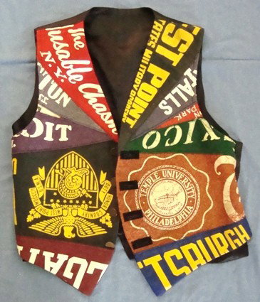Handmade Vintage Pennant Vest: Handmade Vintage Pennant Vest; beautifully made from vintage pennants; includes West Point, Temple University Pennants and others; Lincoln head penny buttons; very unique and interesting piece; no siz