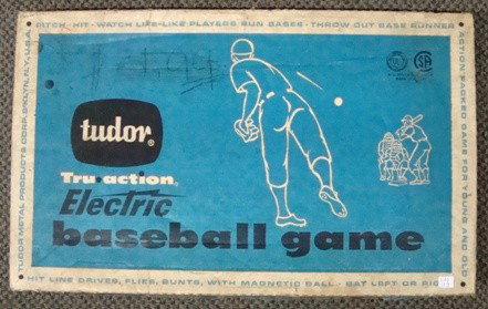 1960's Tudor Tru-Action Baseball Game: 1960's Tudor Tru-Action Electric Baseball Game; complete with original box; NM condition; includes original tin action board, tin backdrop with scoring feature, tin pitch counter, batter, two base run