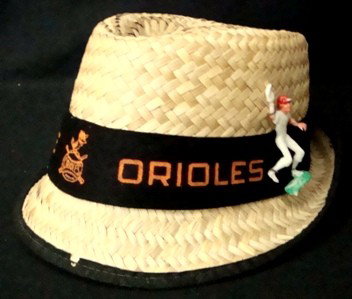 1940's/50's Orioles Straw Fedora: 1940's/50's Baltimore Orioles Straw Fedora; NRMT condition; beautiful fedora with black band and Orioles logo around it; black rim with very small chip on the front and attached baseball player figuri