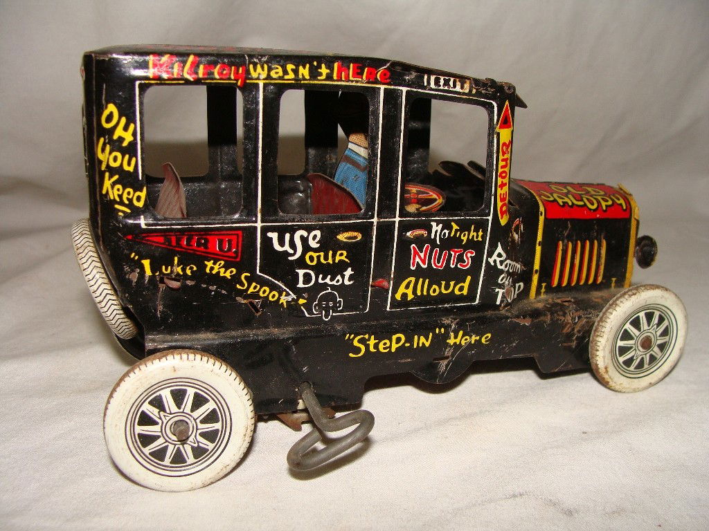 Marx Old Jalopy 1940's working Wind Up Toy w/ Drive: Shows some paint loss, but the graphics are well preserved