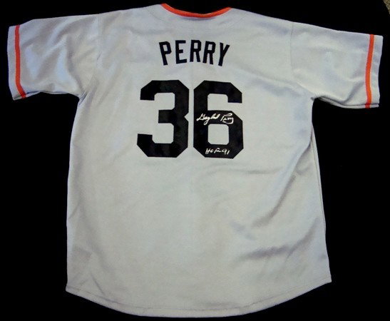 Gaylord Perry Autographed San Francisco Jersey: Gaylord Perry Autographed San Francisco Giants Jersey; signed by Perry on the back of the jersey over the '6' with HOF 91 inscription; signed in silver sharpie marker; gray jersey with orange and blac