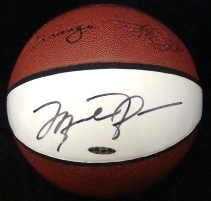 Michael Jordan Autographed Mirage Basketball, UDA: Michael Jordan Autographed Mirage Flight School Full Size Basketball; signed by Jordan in black sharpie marker; comes with Upper Deck Certificate of Authenticity; signed at Michael Jordan's Basketball