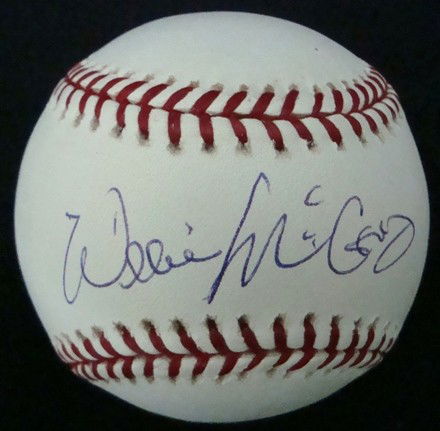 Willie McCovey Autographed Baseball & 8x10, JSA: Official MLB Bud Selig ball signed by Willie McCovey on the sweet spot in blue ballpoint pen; nice, clean signature; also comes with a full color 8x10 action photo of McCovey at bat; signed in blue sh
