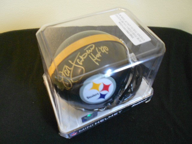 Jack Lambert signed Pittsburgh Steelers Mini-Helme: Beautiful autographed mini with HOF inscription added. Comes with matching holo and photo COA from Gridiron Authentics private signing. Nice item!