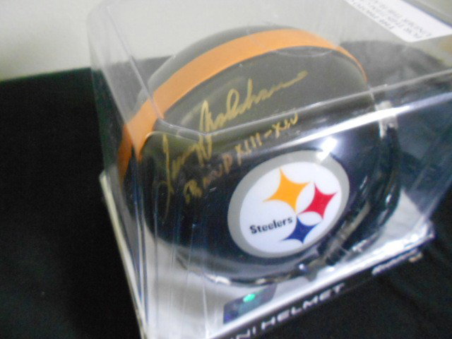 Terry Bradshaw signed Pittsburgh Steelers Mini Hel: Beautiful autographed mini with Superbowl MVP inscriptions added from this favorite Steeler. Comes with matching holo and photo COA from Gridiron Authentics private signing. Nice item!