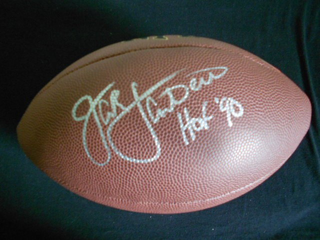 Autographed Jack Lambert Wilson NFL Football with : Beautiful Silver Sharpie signature from Jack Lambert with his HOF inscription added. Comes with matching Holo and Photo COA from Gridiron Authentics.