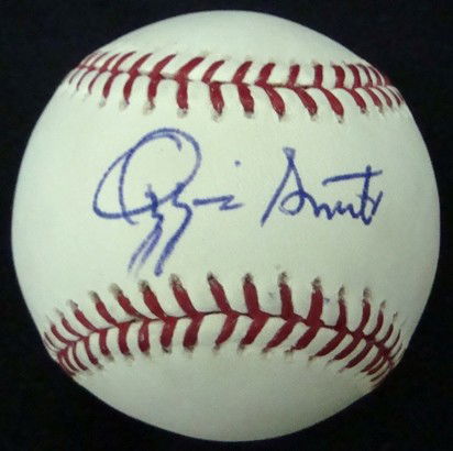 Ozzie Smith Autographed Baseball: Official MLB Bud Selig Ball signed by Smith on the sweet spot in blue ballpoint pen; nice, clean signature; comes with a COA from JSA.