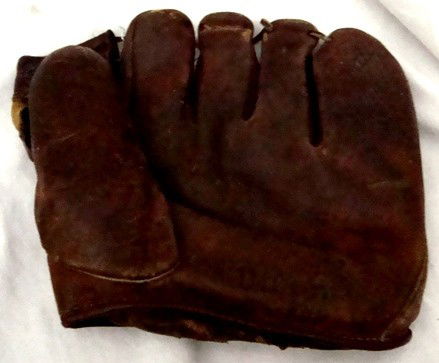 Vintage Wilson A2105 Baseball Mitt: Vintage Wilson A2105 Model Baseball Mitt; nice old mitt with signs of use; laces at the fingertips are loose and the leather is slightly cracked; logo is still good and inside stamping inside pocket i