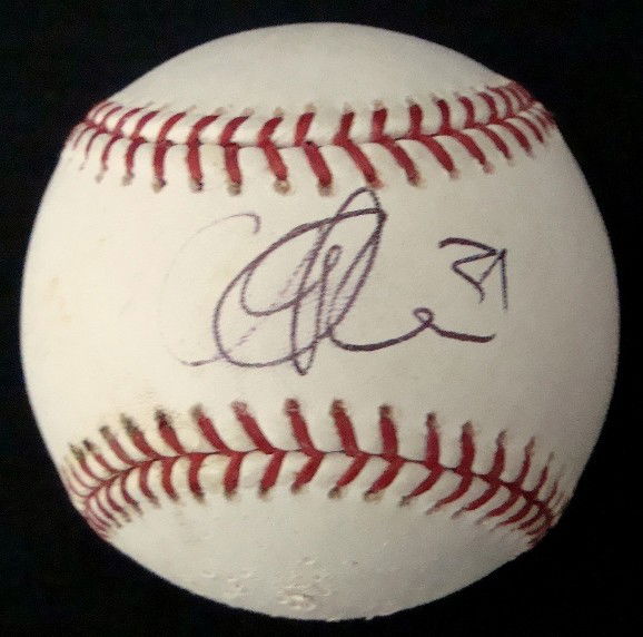 Cliff Lee Autographed Baseball: Cliff Lee Autographed Official ML Bud Selig Baseball; signed by Lee on the sweet spot in black in with '31' inscription; nice, clean signature.